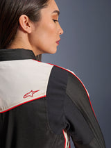 Alpinestars Stella T-Dyno WR Jacket in Black Ecru Bright Red, close-up of the shoulder and back, featuring ecru panels with red piping and a red Alpinestars star logo, women's textile motorcycle gear