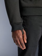 Alpinestars Chrome V2 Sport Hoodie, black motorcycle hoodie with an integrated thumb loop for riding stability.