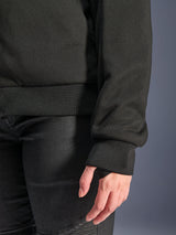 Alpinestars Stella Chrome V2 Sport Hoodie, Black, close-up of ribbed sleeve cuff with thumb hole and ribbed waist hem, tech fleece material for urban motorcycle riding