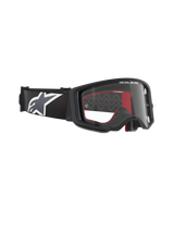 Alpinestars Supertech Corp Goggles, Motocross Goggles, Black frame with Clear lens, adjustable black strap with large white Alpinestars star logo, red foam interior accents, professional eye protection for off-road racing