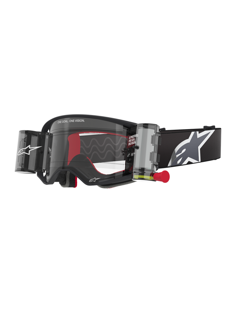 Alpinestars Supertech Corp Goggles Roll Off, Black frame with Clear lens, featuring a Wide Vision Roll-Off system and red pull tab, black strap with a large grey and white Alpinestars logo, technical motocross eyewear with "One Goal. One Vision." branding.