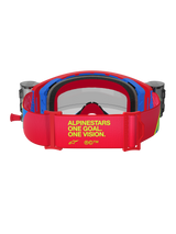 Alpinestars Supertech Corp Goggles, Red and Blue Motocross Goggles, back view showing red adjustable strap with yellow 'ALPINESTARS ONE GOAL. ONE VISION.' branding, integrated roll-off canisters and black multi-layer face foam