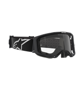 Alpinestars Vision 8 Corp Goggles, Motocross Goggles, Black frame with Clear lens, wide black woven strap featuring white A-star logo, clear protective eyewear with 'ONE GOAL. ONE VISION.' text, professional racing design for off-road performance