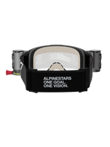 Alpinestars Vision 5 Corp Goggles Roll Off, Motocross Goggles, Black and Clear, rear view featuring a wide black strap with 'ALPINESTARS ONE GOAL. ONE VISION.' branding, roll-off system canisters, and comfortable multi-layer face foam
