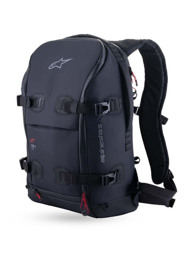 Alpinestars AMP-7 Backpack, Technical Motorcycle Touring Backpack, Black, Front Three-Quarter View Featuring Four Load Compression Straps, Ergonomic Padded Shoulder Straps, and Red Accent Pulls.