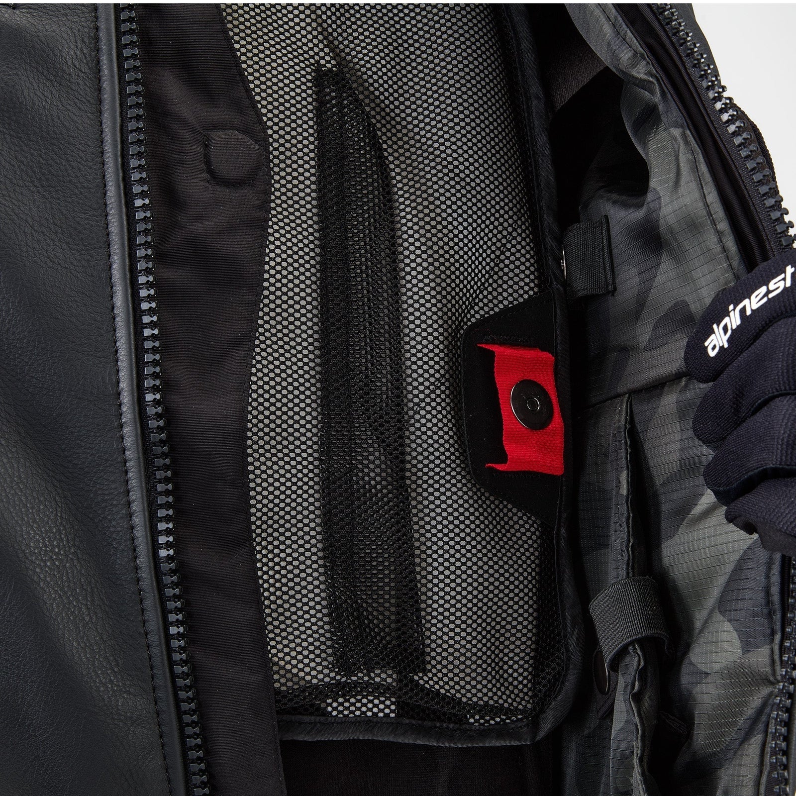 Alpinestars Tech-Air 3 Leather System, black motorcycle airbag vest with interior mesh pocket and red pull tab detail.