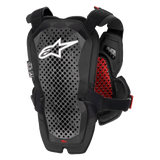 Alpinestars A-1 Pro Chest Protector, Anthracite Black and Red, rear view showing the back protector panel, perforated Polyhedron Technology for ventilation, white Astars logo, red interior honeycomb padding, off-road motorcycle protection gear