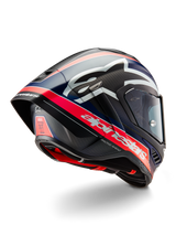 Alpinestars Supertech R10 Team Helmet, Professional Motorcycle Racing Helmet, Black Carbon with Fluorescent Red and Matte Blue accents, aerodynamic rear view showing integrated spoiler, bold Alpinestars branding, and visible carbon fiber shell texture.