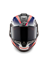 Alpinestars Supertech R10 Team Helmet, Full-face Motorcycle Racing Helmet, Black Carbon with Matte Blue and Red Fluo Graphics, Front View with Dark Smoke Visor, aerodynamic design with integrated air vents, high-performance racing gear