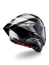 Alpinestars Supertech R10 Element Helmet, Black Carbon Silver Black Glossy, rear three-quarter view showing aerodynamic racing profile, glossy carbon fiber shell with geometric grey and black graphics, Alpinestars logo, and red interior padding