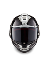 Alpinestars Supertech R10 Element Helmet, Full-Face Racing Helmet, Black Carbon Silver Black Glossy, front view showing dark smoke visor and glossy carbon fiber weave with silver aerodynamic graphics and Alpinestars logos