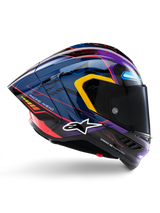Alpinestars Supertech R10 Martinator Limited Edition Helmet, motorcycle racing helmet, glossy blue and purple with yellow and red accents, dark tinted visor, aerodynamic side profile featuring geometric patterns and 'RACING AHEAD' text, professional racing protection