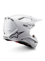 Alpinestars Supertech M10 Solid Helmet ECE 22.06, white glossy motocross helmet with black graphics, red accents, ventilation ports and peak visor
