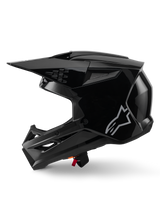 Alpinestars S-M3 Solid Helmet, Motocross Helmet, Black Glossy, side profile view, featuring a silver Alpinestars logo, aerodynamic visor, and multiple ventilation ports for off-road racing