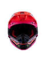 Alpinestars Supertech M10 Deegan Monster ECE 22.06 Helmet, front view of motocross helmet in Orange Fluo, Purple, and Pink Gloss, featuring Monster Energy claw logos on the black chin bar, aerodynamic design with integrated ventilation ports, premium off-road racing head protection