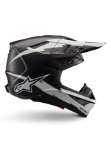 Alpinestars Supertech M10 Ampress Helmet, Motocross Racing Helmet, Black and White Matte, aerodynamic profile with white lightning bolt graphics, multiple air vents, extended sun visor, carbon fiber construction with matte finish