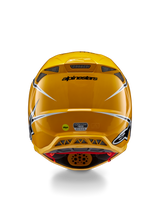 Alpinestars Supertech M10 Ampress Helmet, Rear view, Glossy Yellow with black and white accents, featuring rear exhaust vents, MIPS and ECE 22.06 stickers, professional motocross head protection