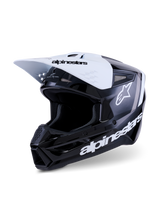 Alpinestars S-M3 Radium Helmet, Motocross Helmet, Black White and Gray Glossy, featuring a white visor with black branding, glossy black shell with prominent white Alpinestars logos and gray graphic accents, aerodynamic design for off-road racing