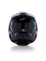 Alpinestars S-M3 Radium Helmet ECE 22.06, Motocross Helmet, Black White Gray Glossy, rear view showing glossy black finish, Alpinestars star logo, ventilation exhaust ports, and ECE certification label.