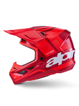 Alpinestars S-M7 Core Helmet, Red Glossy with geometric accents, Motocross Helmet, side profile view, aerodynamic shell with ventilation ports and white branding, high-performance off-road racing gear
