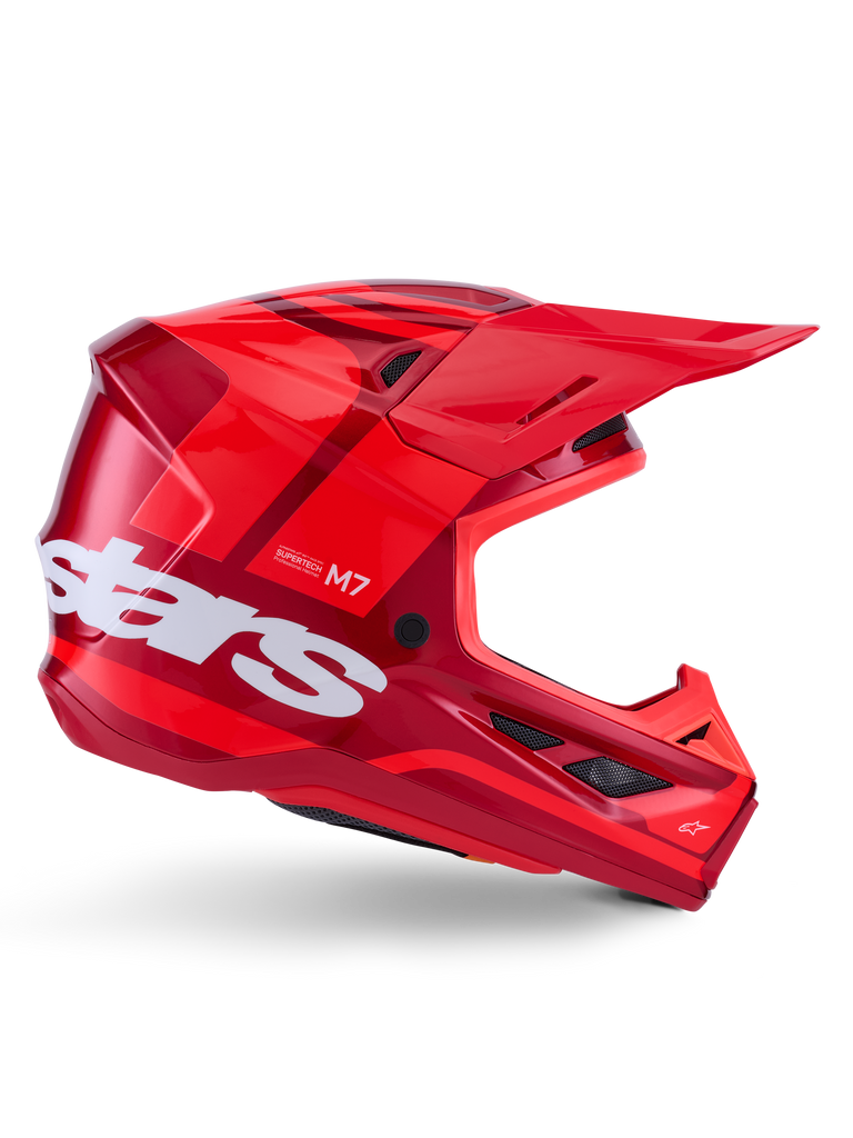 Alpinestars S-M7 Core Helmet, Motocross Helmet, Red Glossy with dark red accents and white branding, side view featuring large white stars logo, aerodynamic shell with mesh ventilation ports and a prominent visor