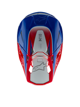 Alpinestars Supertech M10 Aeon Helmet, Motocross Helmet, Bright Red and Blue Glossy, top-down view showing silver central panel with M10 branding, aerodynamic shell with red and blue accents, mesh ventilation ports, high-performance motocross head protection