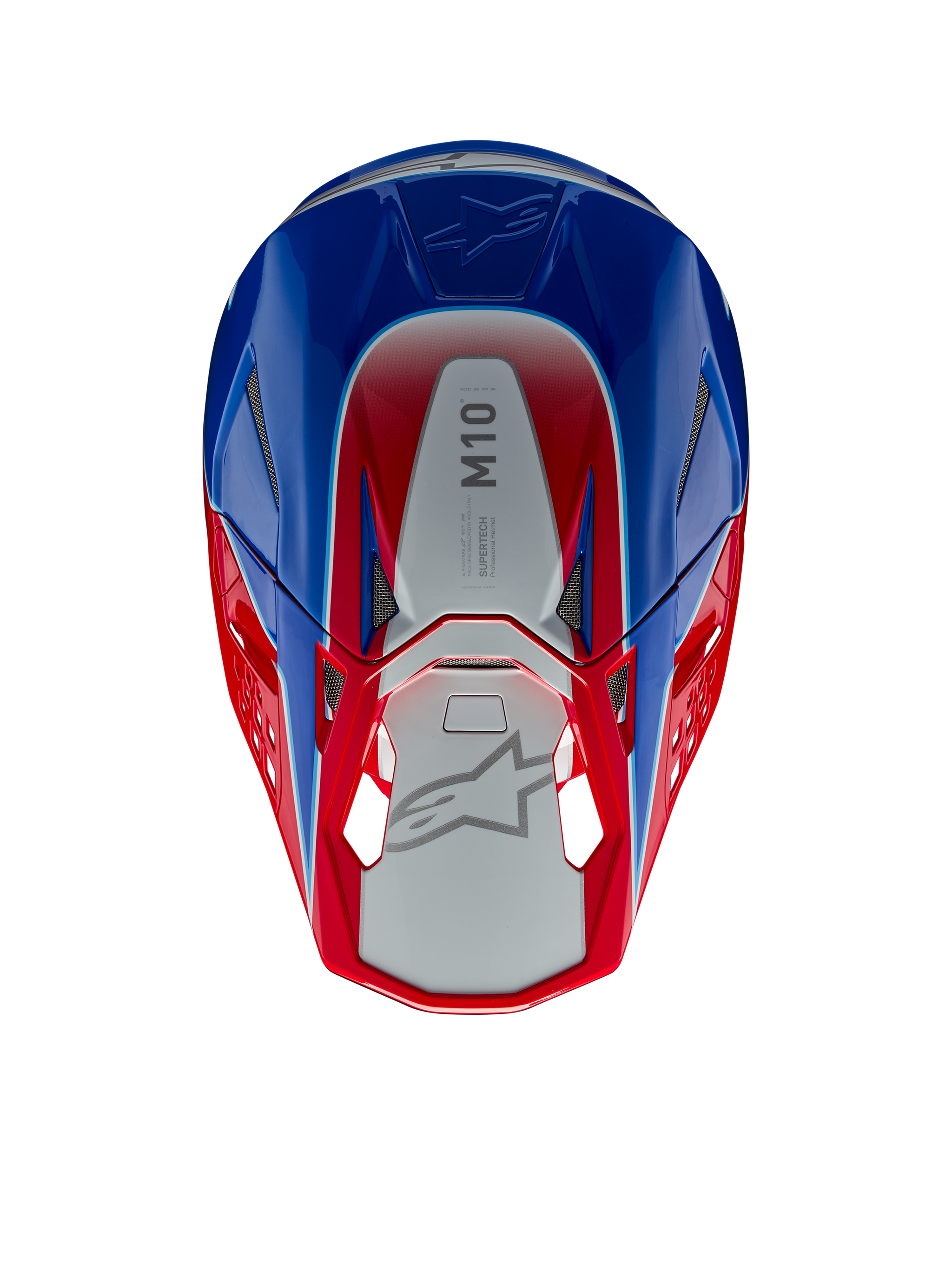 Alpinestars Supertech M10 Aeon Helmet, Motocross Helmet, Bright Red and Blue Glossy, top-down view showing silver central panel with M10 branding, aerodynamic shell with red and blue accents, mesh ventilation ports, high-performance motocross head protection