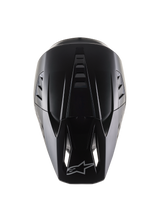 Alpinestars S-M5 Solid Helmet ECE 22.06, Motocross Helmet, Black Matt, top-down view showing the aerodynamic shell with ventilation ridges, visor featuring air intake ports and Alpinestars logo, sleek matte finish designed for off-road racing.