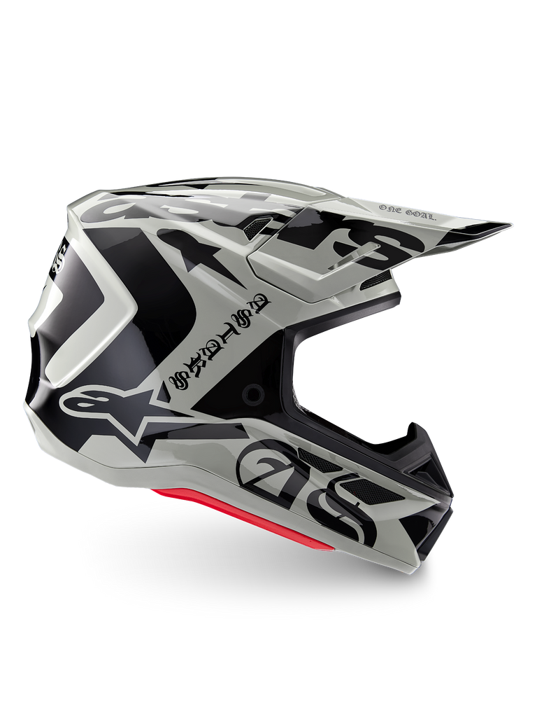 Alpinestars Limited Edition S-M7 Wolf Dust Helmet, Dune Black Glossy motocross helmet, side profile featuring bold black graphics and branding, red base accents, aerodynamic off-road head protection
