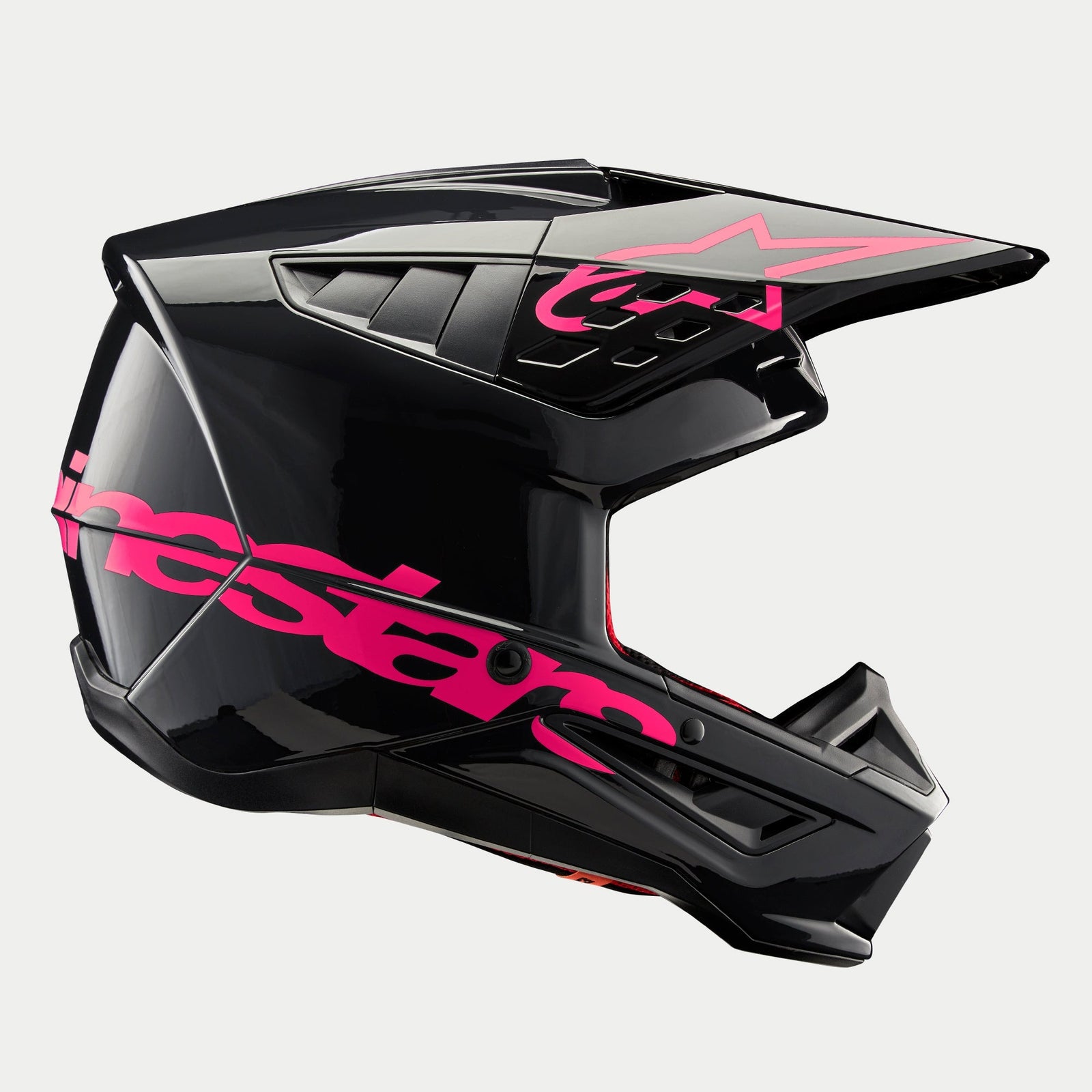 Alpinestars S-M5 Corp Helmet, Motocross Helmet, Black Diva Pink Glossy, side profile view, glossy black finish with vibrant pink branding, aerodynamic shell with ventilation ports for off-road racing protection