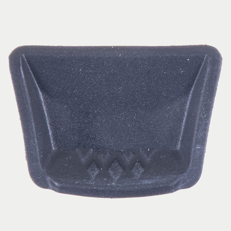 Alpinestars Supertech R10 Rubber Plug Chin Vent, Helmet Accessory, Black, molded rubber component for S-R10 helmet, featuring a textured trapezoidal design for secure ventilation management.