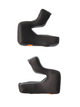 Alpinestars S-M7 Cheek Pad Set, Replacement Helmet Padding, Black with textured honeycomb fabric and gray mesh edges, contoured foam pads for ergonomic fit, featuring orange emergency release tabs, motorcycle helmet accessories