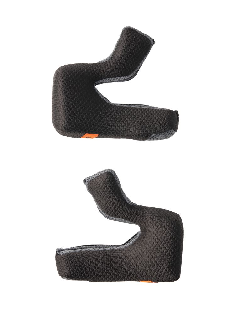 Alpinestars S-M7 Cheek Pad Set, Replacement Helmet Padding, Black with textured honeycomb fabric and gray mesh edges, contoured foam pads for ergonomic fit, featuring orange emergency release tabs, motorcycle helmet accessories