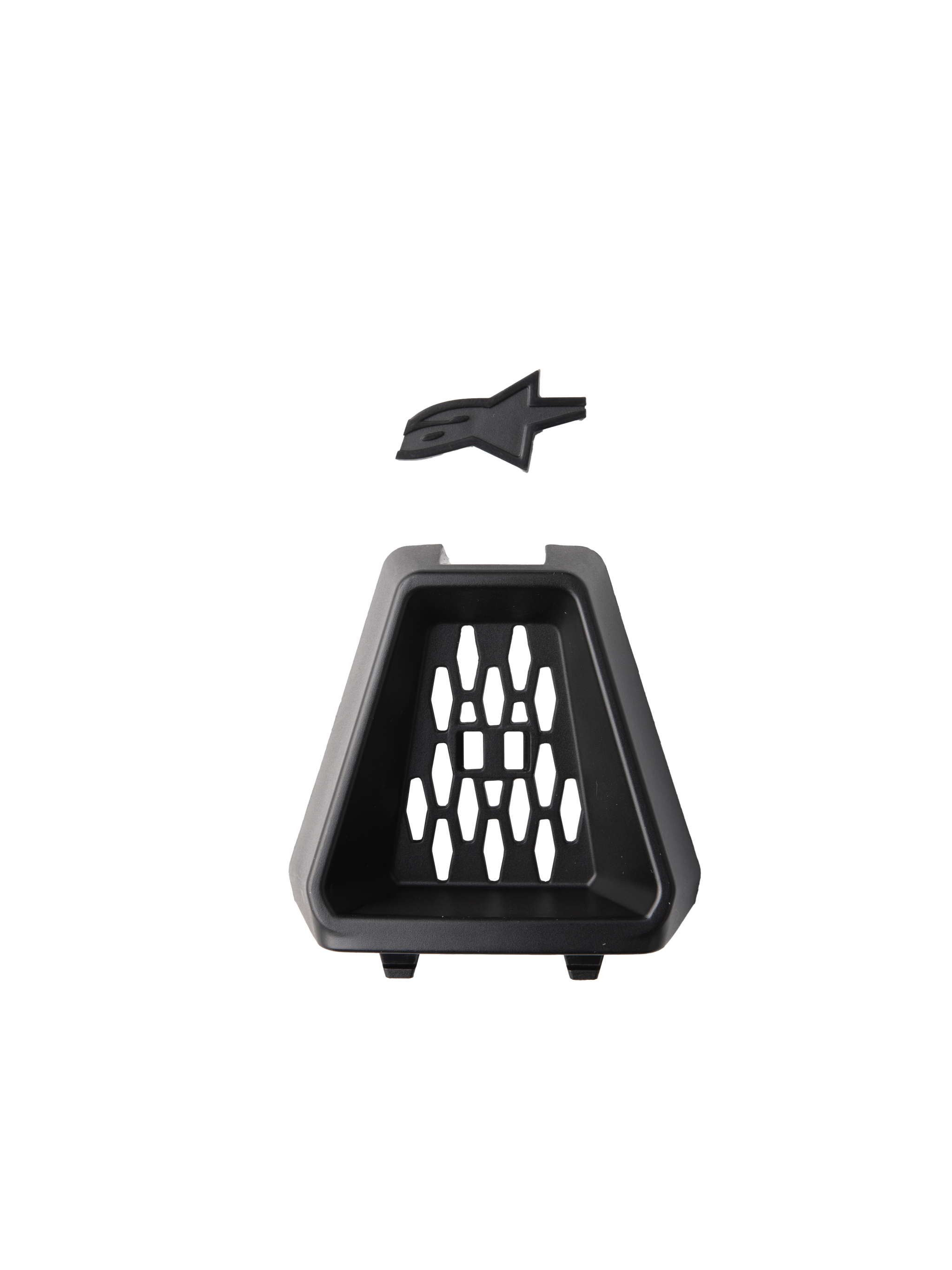 Alpinestars S-M3 Chin Vent, Helmet Accessory, Black, official replacement part featuring a trapezoidal plastic vent with a honeycomb pattern and a separate black Astars logo insert, designed for off-road motorcycle helmets.