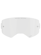Alpinestars Supertech Clear Lens, replacement motocross goggle lens, transparent impact-resistant polycarbonate, "ONE GOAL. ONE VISION." text on top and small logo detail, features side mounting points for tear-offs