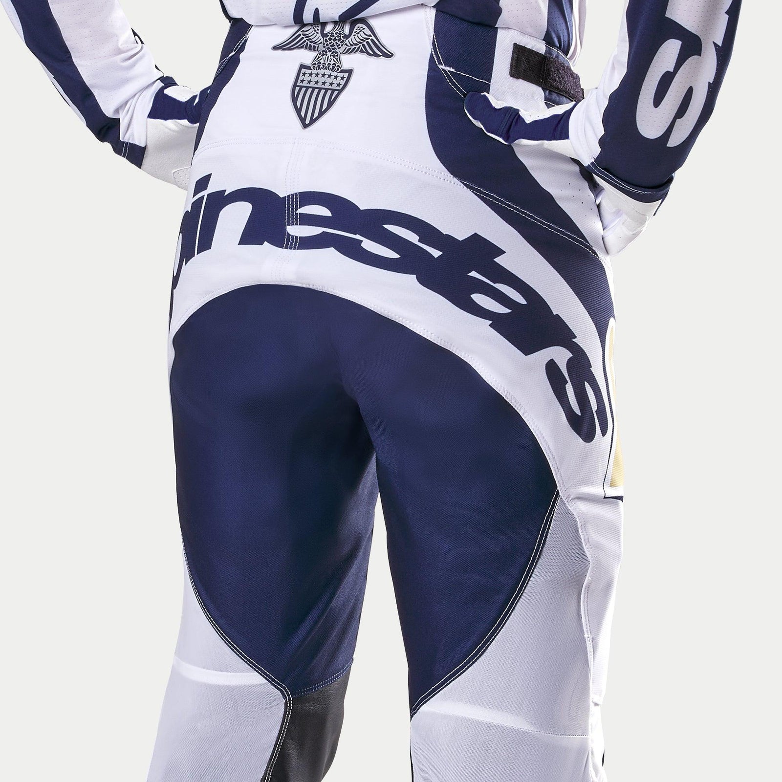 Alpinestars Techstar Dress Whites Tropical LE Men's Motocross Pants, rear detail in white and dark blue with gold accents.