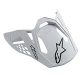 Alpinestars Supertech M10 Dyno Helmet Visor, Matte White, featuring black Alpinestars star logos, motocross racing peak with geometric cutouts for airflow, matte finish, aerodynamic design for off-road performance