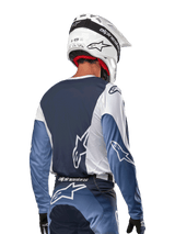 Alpinestars 2024 Racer Hoen Jersey, a white and navy men's motocross top, features moisture-wicking technical fabric.