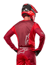 Alpinestars 2024 Racer Hoen Jersey, back view of red and burgundy moisture-wicking motocross top for off-road racing.