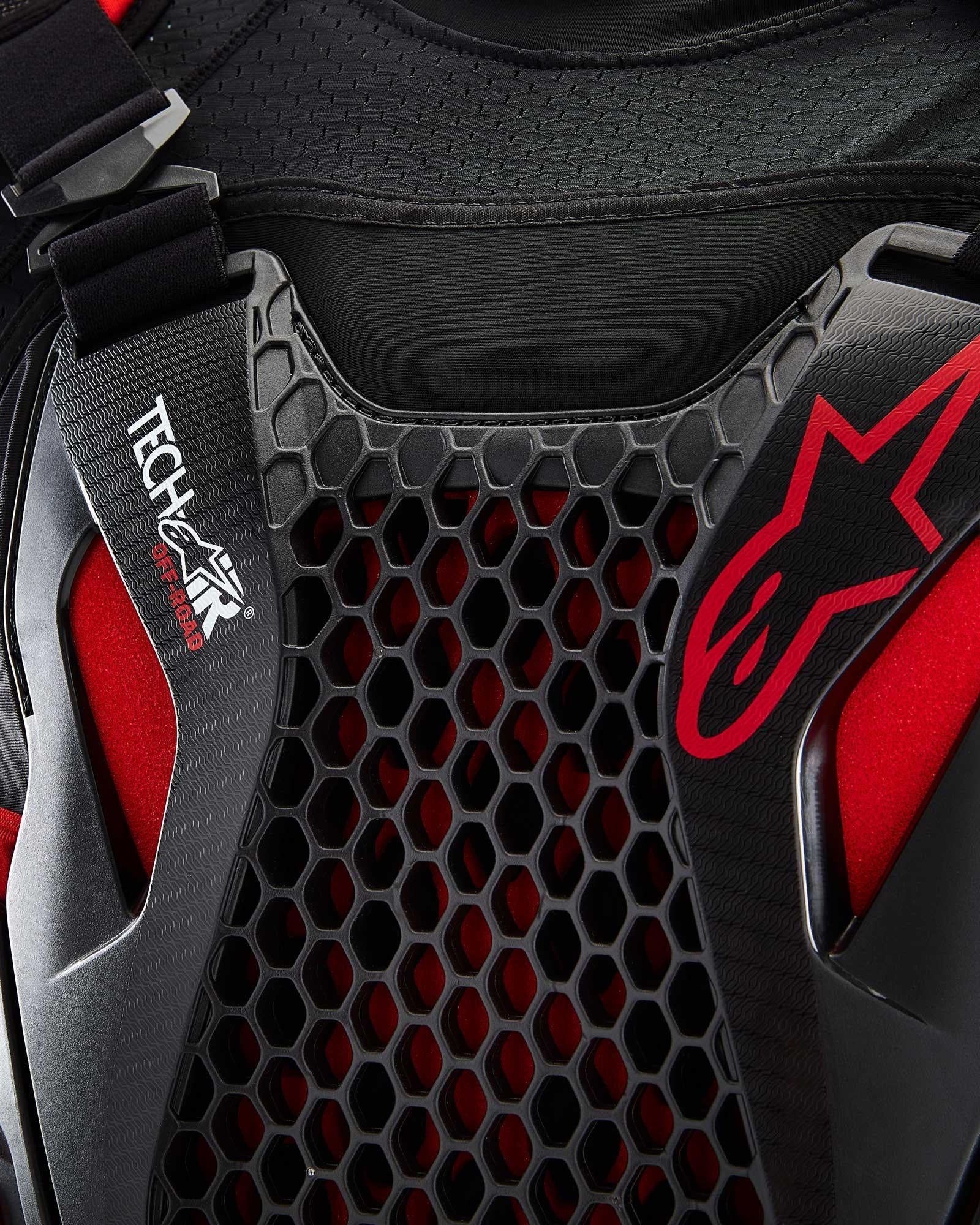 Tech-Air® Off-Road System detail featuring black honeycomb Nucleon CELL protection and red Alpinestars branding.