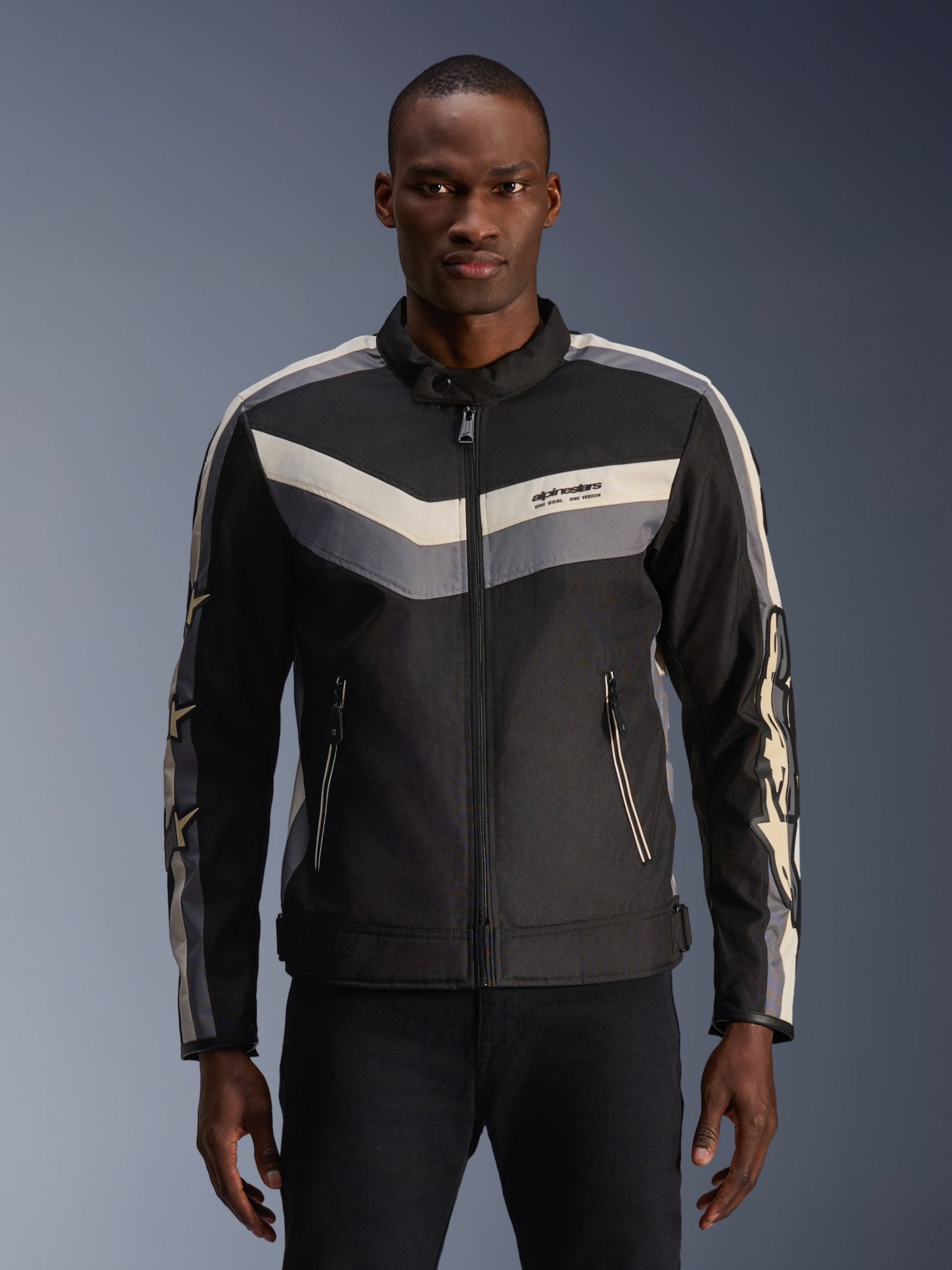 Alpinestars T-Dyno WR Jacket, textile motorcycle jacket, Black Dark Gray and Ecru, featuring chevron stripe patterns on the chest and arms, vintage-inspired biker fit with stand-up collar, urban contemporary road gear