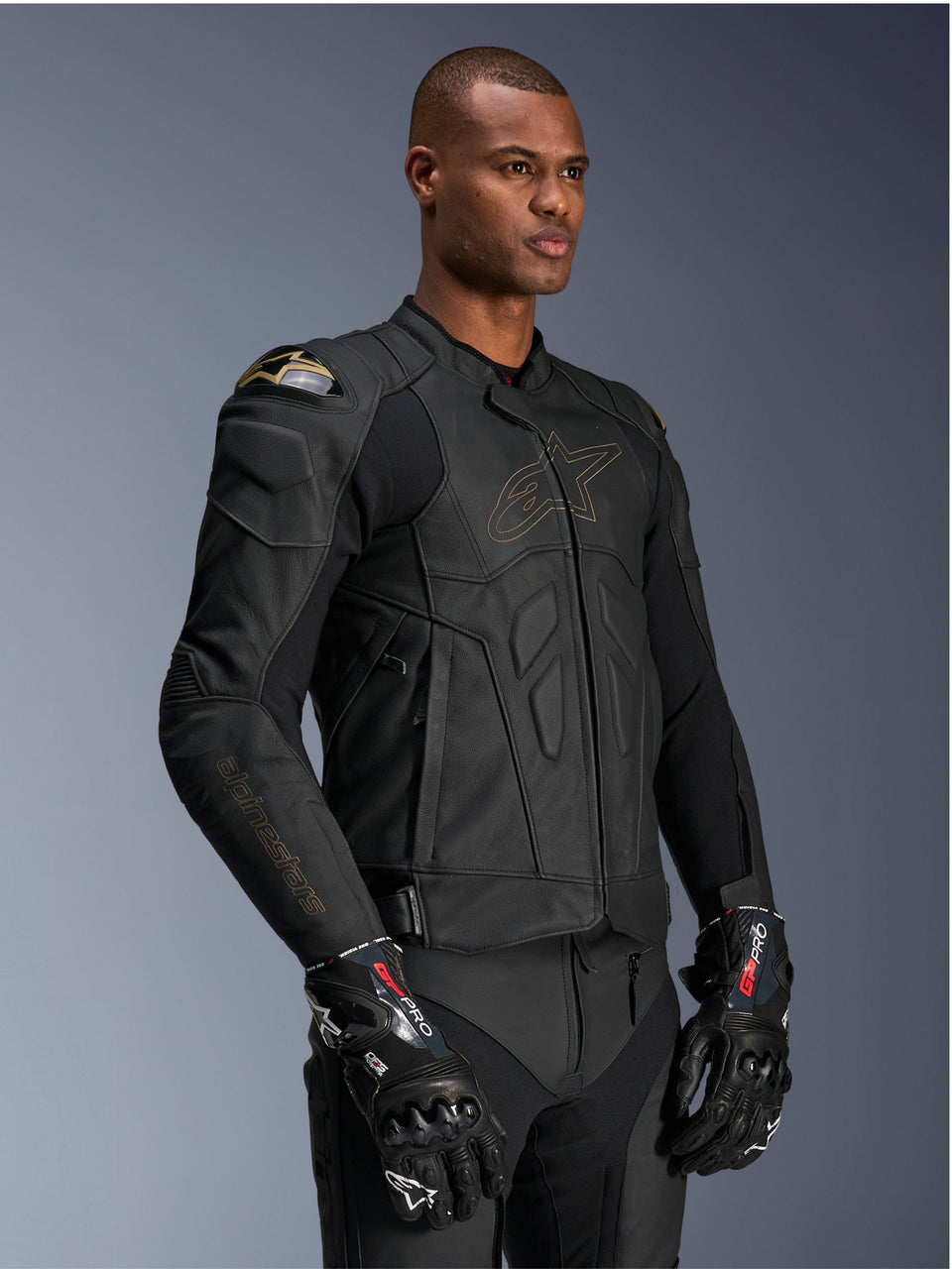 Alpinestars Dusk Leather Jacket, Men's Black Laser leather jacket with DFS shoulder protection and gold logo outline.