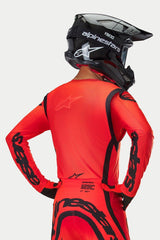 Alpinestars Supertech Ember LE Jersey, Red Fluo and Black motocross racing gear featuring lightweight mesh and athletic fit.